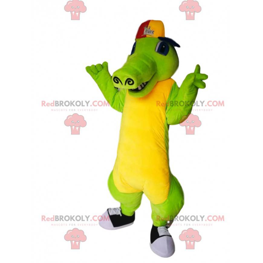 Mascotte coccodrillo verde e giallo con un berretto -