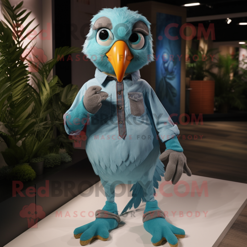 Cyan Quail mascot costume character dressed with a Button-Up Shirt and Anklets