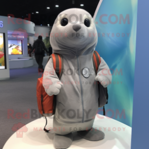 Gray Seal mascot costume character dressed with a Hoodie and Messenger bags