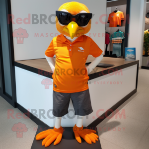Orange Crow mascot costume character dressed with a Graphic Tee and Sunglasses