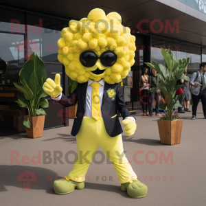Lemon Yellow Cauliflower mascot costume character dressed with a Suit Jacket and Anklets