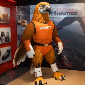 Rust Hawk mascot costume character dressed with a Rash Guard and Foot pads