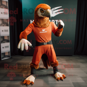 Rust Hawk mascot costume character dressed with a Rash Guard and Foot pads