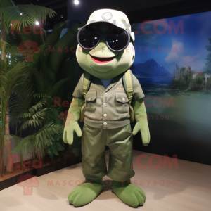 Olive Cod mascot costume character dressed with a Bermuda Shorts and Sunglasses