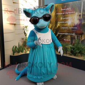 Turquoise Armadillo mascot costume character dressed with a Empire Waist Dress and Eyeglasses