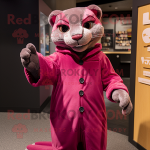Pink Jaguarundi mascot costume character dressed with a Culottes and Cufflinks
