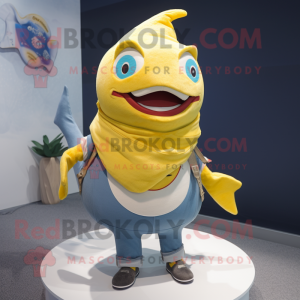 Gold Tuna mascot costume character dressed with a Jeans and Scarves