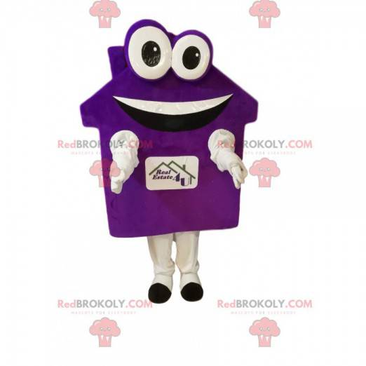 Purple house mascot with big eyes and a broad smile -