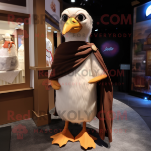 Brown Seagull mascot costume character dressed with a Henley Shirt and Shawls