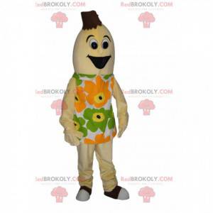 Mascotte banana molto felice con un vestito floreale -