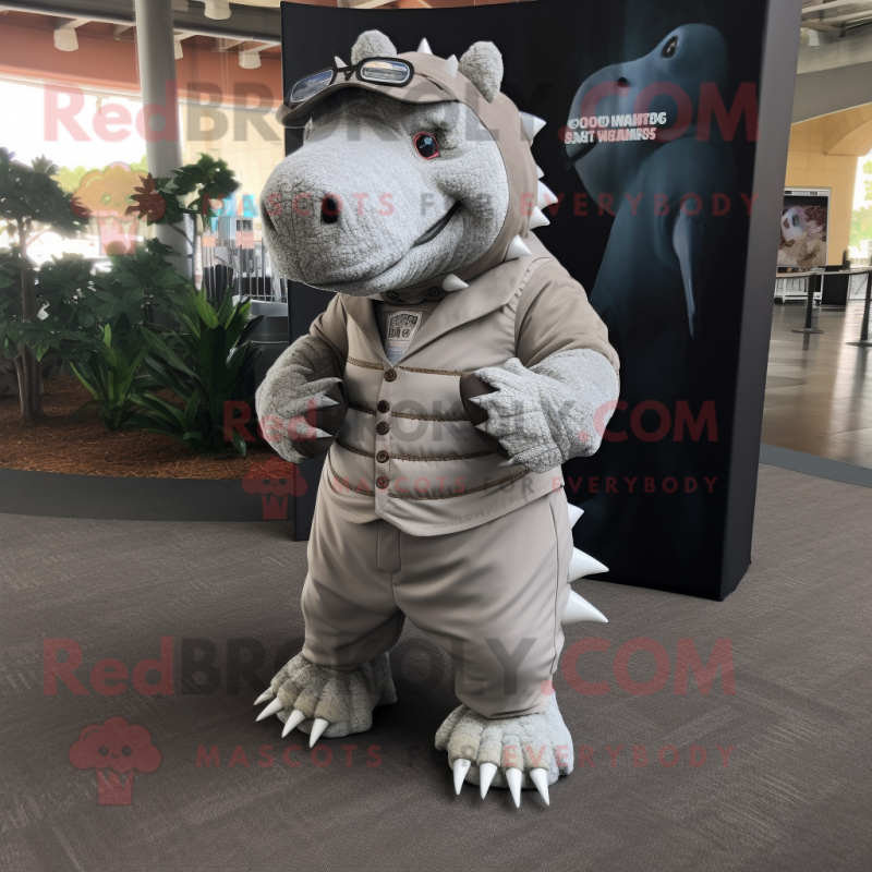Silver Ankylosaurus mascot costume character dressed with a Cargo Pants and Tie pins