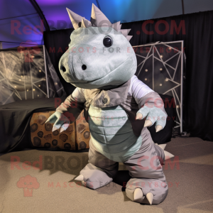 Silver Ankylosaurus mascot costume character dressed with a Cargo Pants and Tie pins