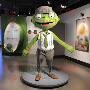 Olive Trapeze Artist mascot costume character dressed with a Dress Shirt and Lapel pins