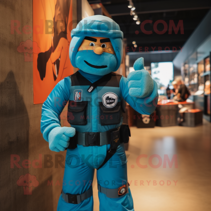 Turquoise Gi Joe mascot costume character dressed with a Cargo Pants and Hairpins Turquoise Gi Joe mascot costume character dressed with a Cargo Pants and Hairpins