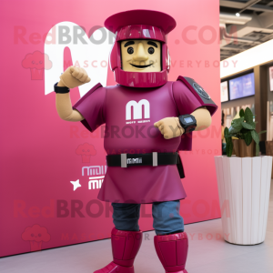 Magenta Roman Soldier mascot costume character dressed with a Denim Shirt and Smartwatches