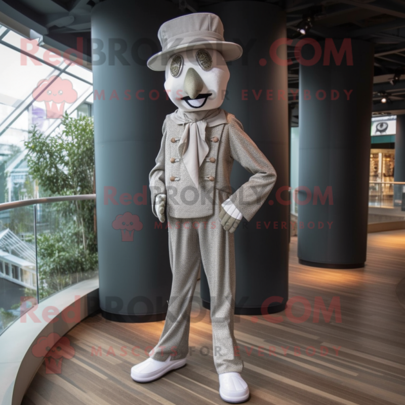 Silver Stilt Walker mascot costume character dressed with a Corduroy Pants and Berets