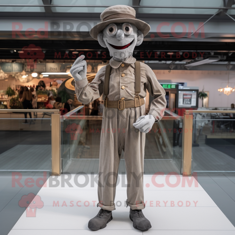 Silver Stilt Walker mascot costume character dressed with a Corduroy Pants and Berets
