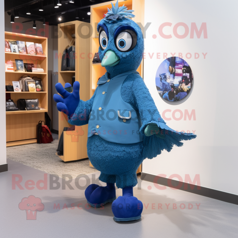 Navy Peacock mascot costume character dressed with a Boyfriend Jeans and Mittens