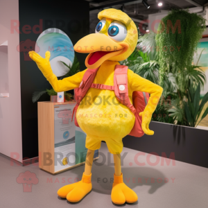 Yellow Flamingo mascot costume character dressed with a Capri Pants and Backpacks