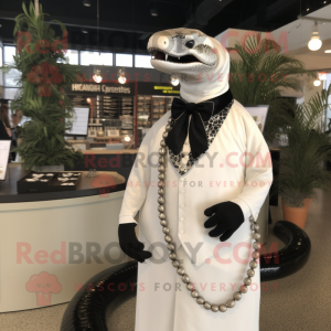 Cream Titanoboa mascot costume character dressed with a Tuxedo and Necklaces