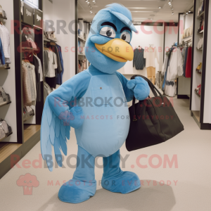 Sky Blue Dodo Bird mascot costume character dressed with a Bootcut Jeans and Tote bags