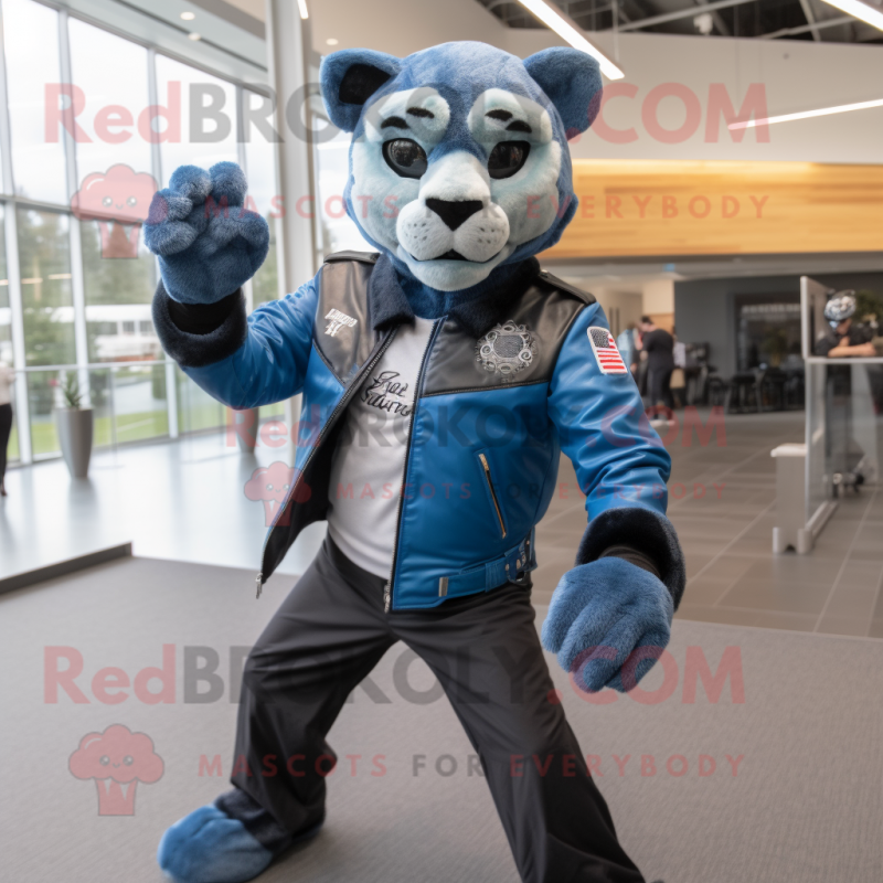 Blue Mountain Lion mascot costume character dressed with a Moto Jacket and Backpacks Blue Mountain Lion mascot costume character dressed with a Moto Jacket and Backpacks