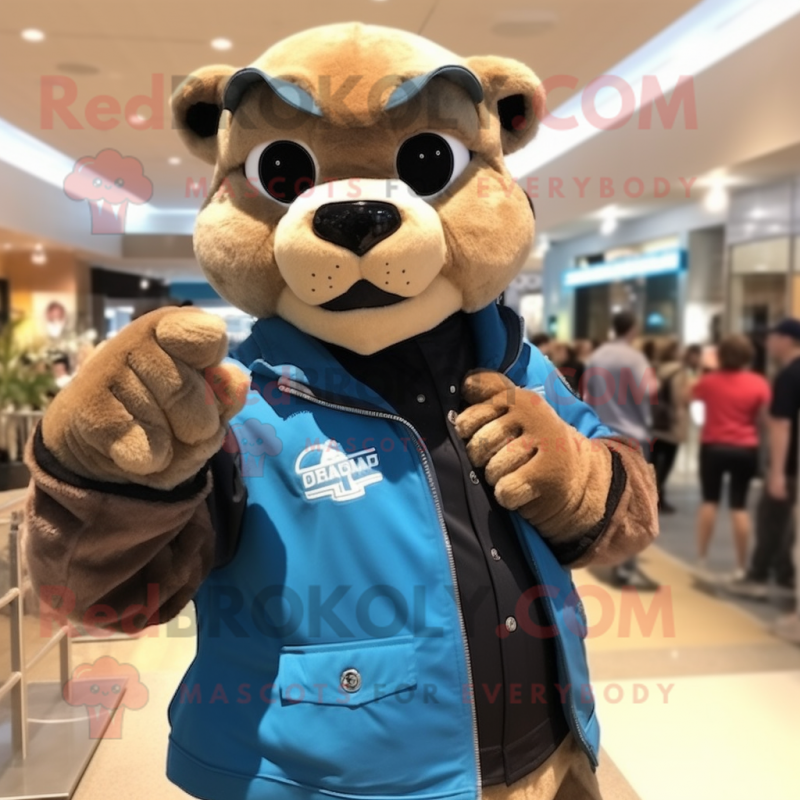 Blue Mountain Lion mascot costume character dressed with a Moto Jacket and Backpacks Blue Mountain Lion mascot costume character dressed with a Moto Jacket and Backpacks