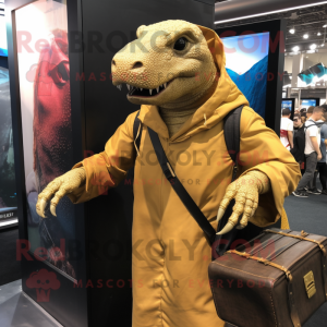 Gold Komodo Dragon mascot costume character dressed with a Hoodie and Briefcases