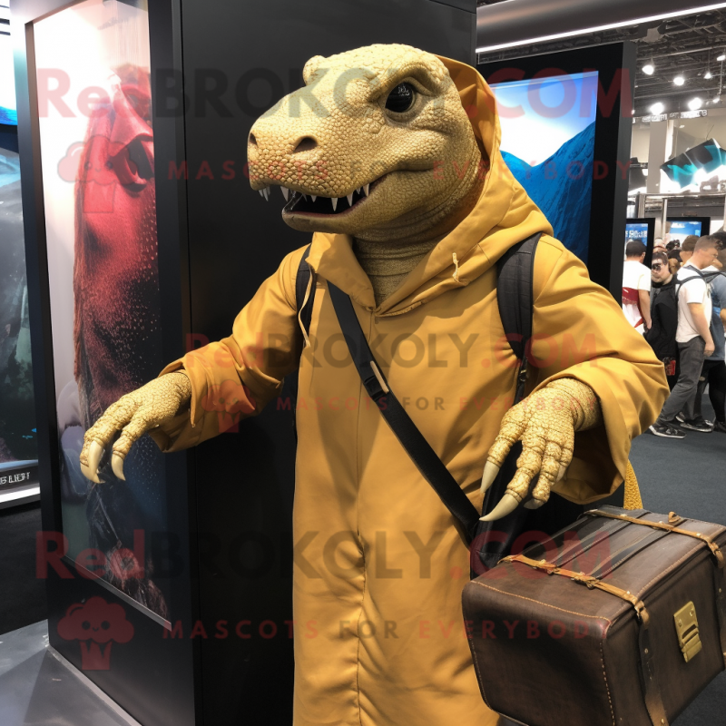 Gold Komodo Dragon mascot costume character dressed with a Hoodie and Briefcases Gold Komodo Dragon mascot costume character dressed with a Hoodie and Briefcases