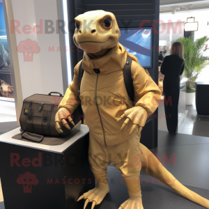 Gold Komodo Dragon mascot costume character dressed with a Hoodie and Briefcases