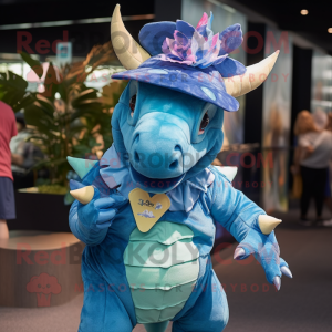 Blue Triceratops mascot costume character dressed with a Playsuit and Hat pins