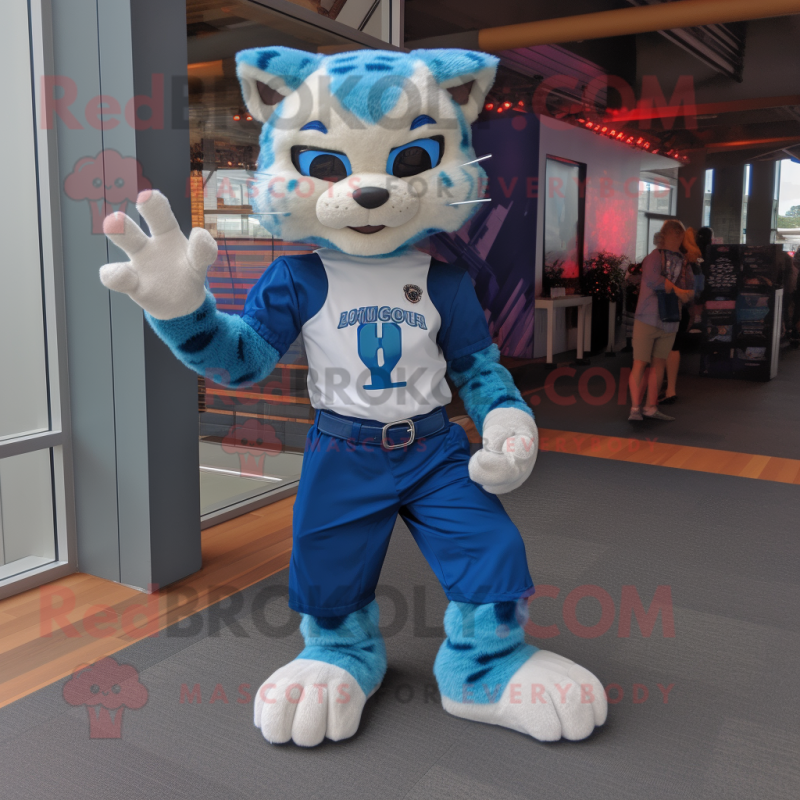 Blue Bobcat mascot costume character dressed with a Graphic Tee and Foot pads