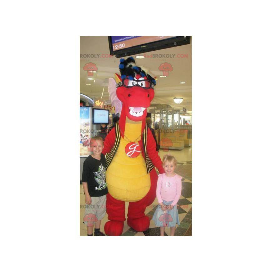 Mascote dinossauro vermelho e amarelo com óculos -