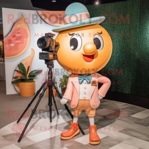 Peach Camera mascot costume character dressed with a Shorts and Bow ties