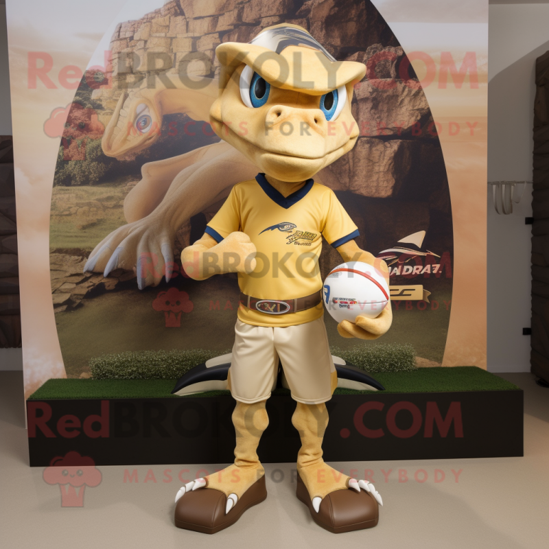 Gold Dimorphodon mascot costume character dressed with a Rugby Shirt and Foot pads