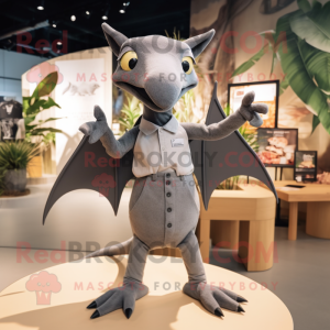 Gray Pterodactyl mascot costume character dressed with a Jumpsuit and Suspenders