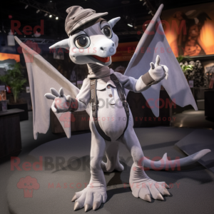 Gray Pterodactyl mascot costume character dressed with a Jumpsuit and Suspenders