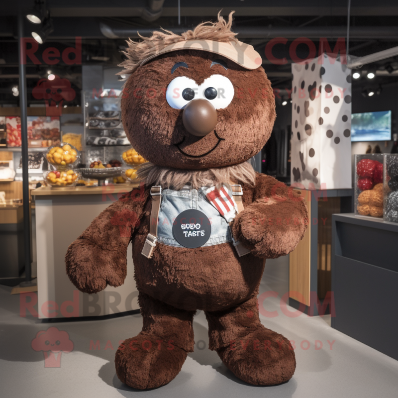 Brown Meatballs mascot costume character dressed with a Dungarees and Scarf clips Brown Meatballs mascot costume character dressed with a Dungarees and Scarf clips