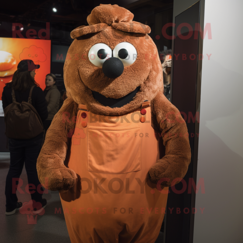 Brown Meatballs mascot costume character dressed with a Dungarees and Scarf clips Brown Meatballs mascot costume character dressed with a Dungarees and Scarf clips