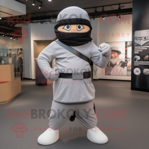 Gray Ninja mascot costume character dressed with a Henley Tee and Berets