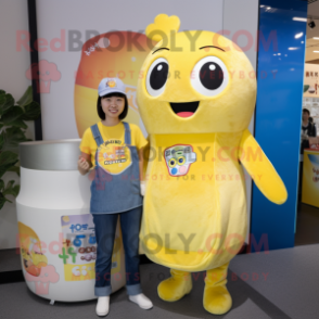 Yellow Miso Soup mascot costume character dressed with a Chambray Shirt and Keychains