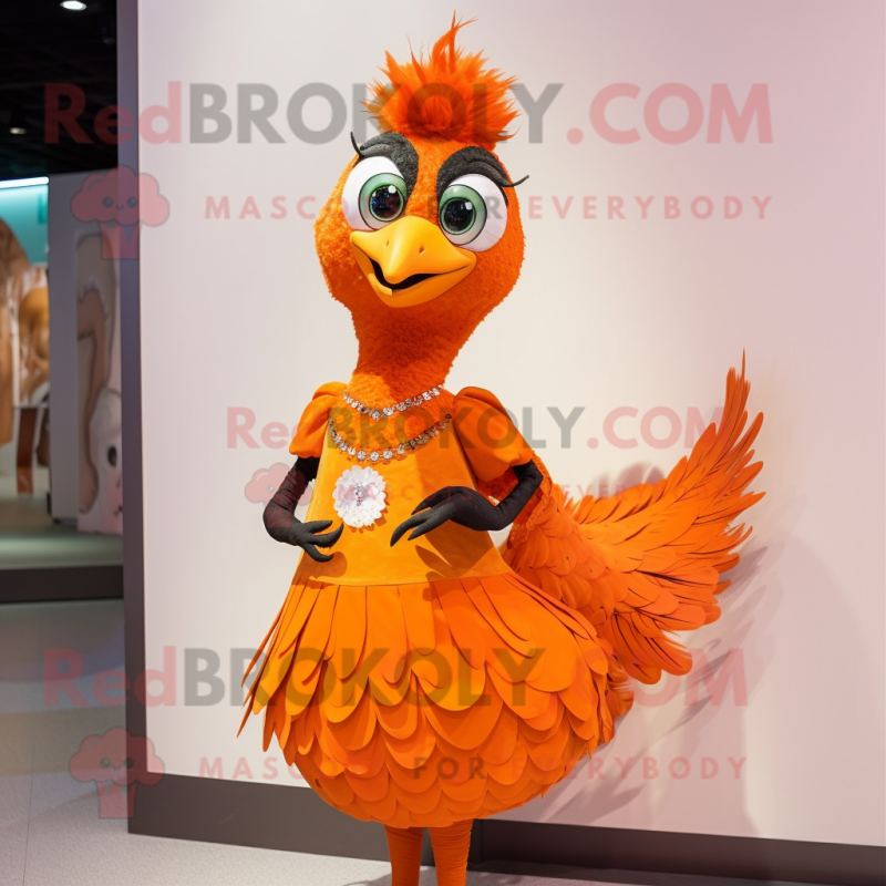 Orange Peacock mascot costume character dressed with a Pleated Skirt and Lapel pins Orange Peacock mascot costume character dressed with a Pleated Skirt and Lapel pins