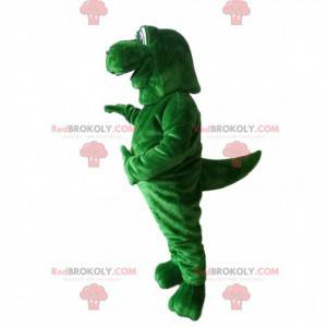Giant green dinosaur mascot with protruding eyes -