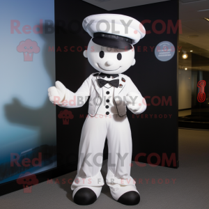 White Bracelet mascot costume character dressed with a Dress Pants and Hat pins