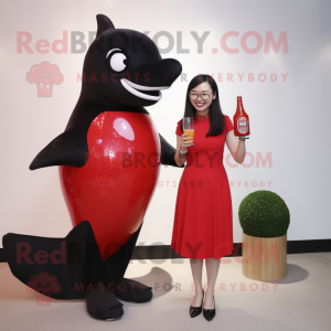 Red Killer Whale mascot costume character dressed with a Cocktail Dress and Smartwatches