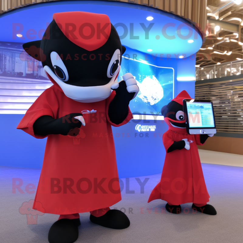 Red Killer Whale mascot costume character dressed with a Cocktail Dress and Smartwatches