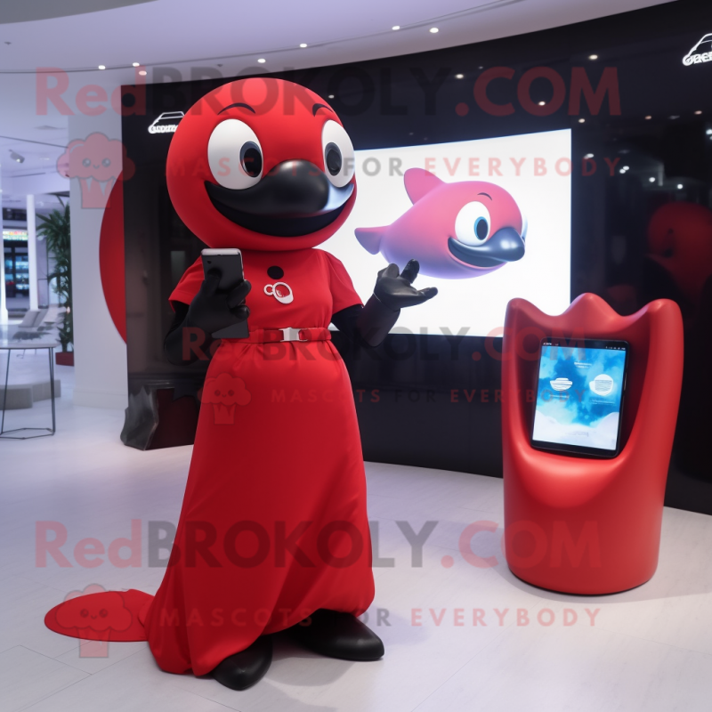 Red Killer Whale mascot costume character dressed with a Cocktail Dress and Smartwatches Red Killer Whale mascot costume character dressed with a Cocktail Dress and Smartwatches
