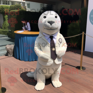 Cream Seal mascot costume character dressed with a Suit Jacket and Pocket squares
