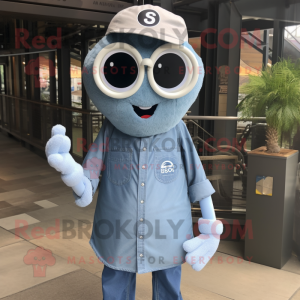 Silver Bagels mascot costume character dressed with a Chambray Shirt and Eyeglasses