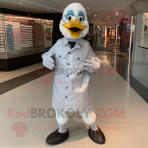 Silver Geese mascot costume character dressed with a Dress Shirt and Shoe clips